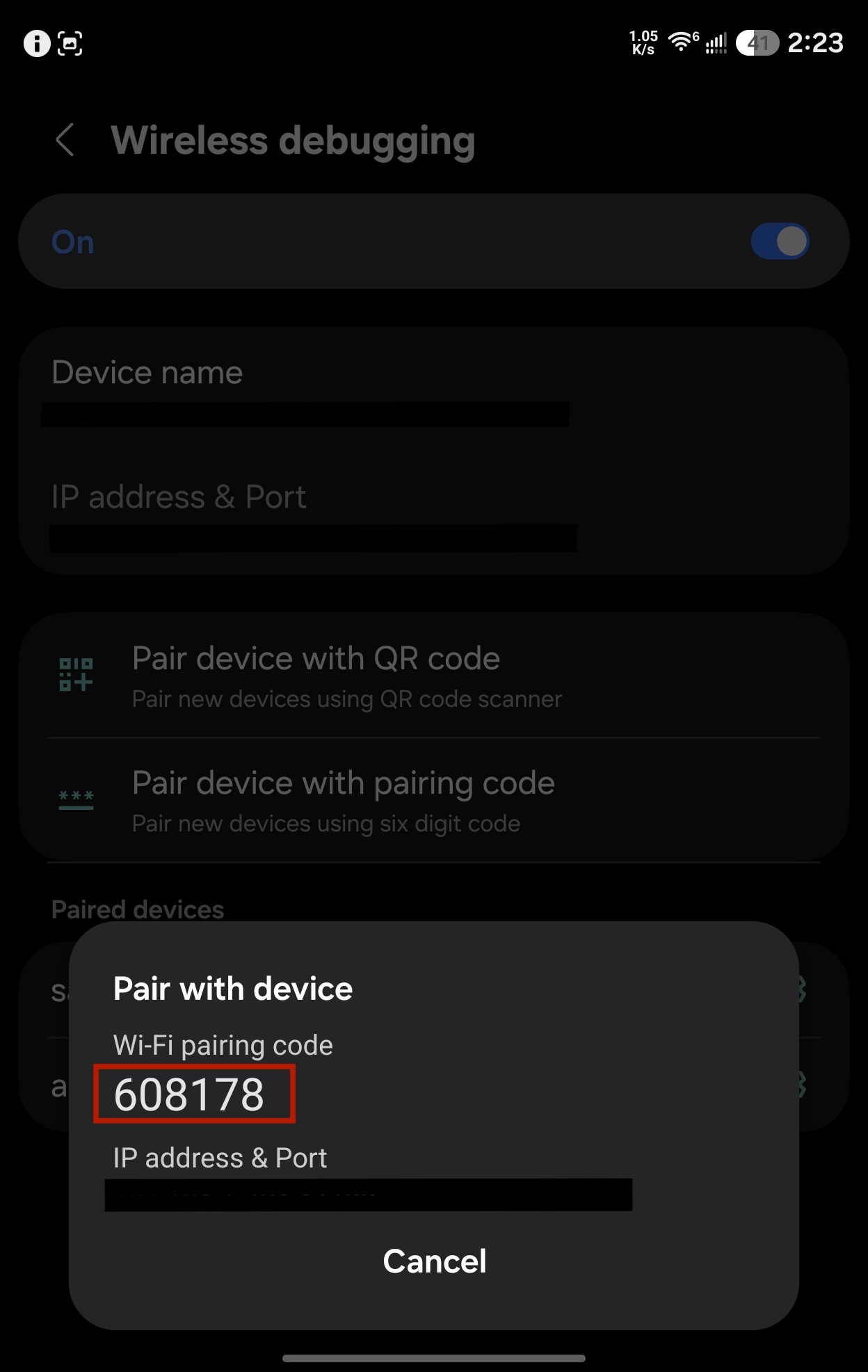 Pair with device dialog showing a six-digit Wi-Fi pairing code