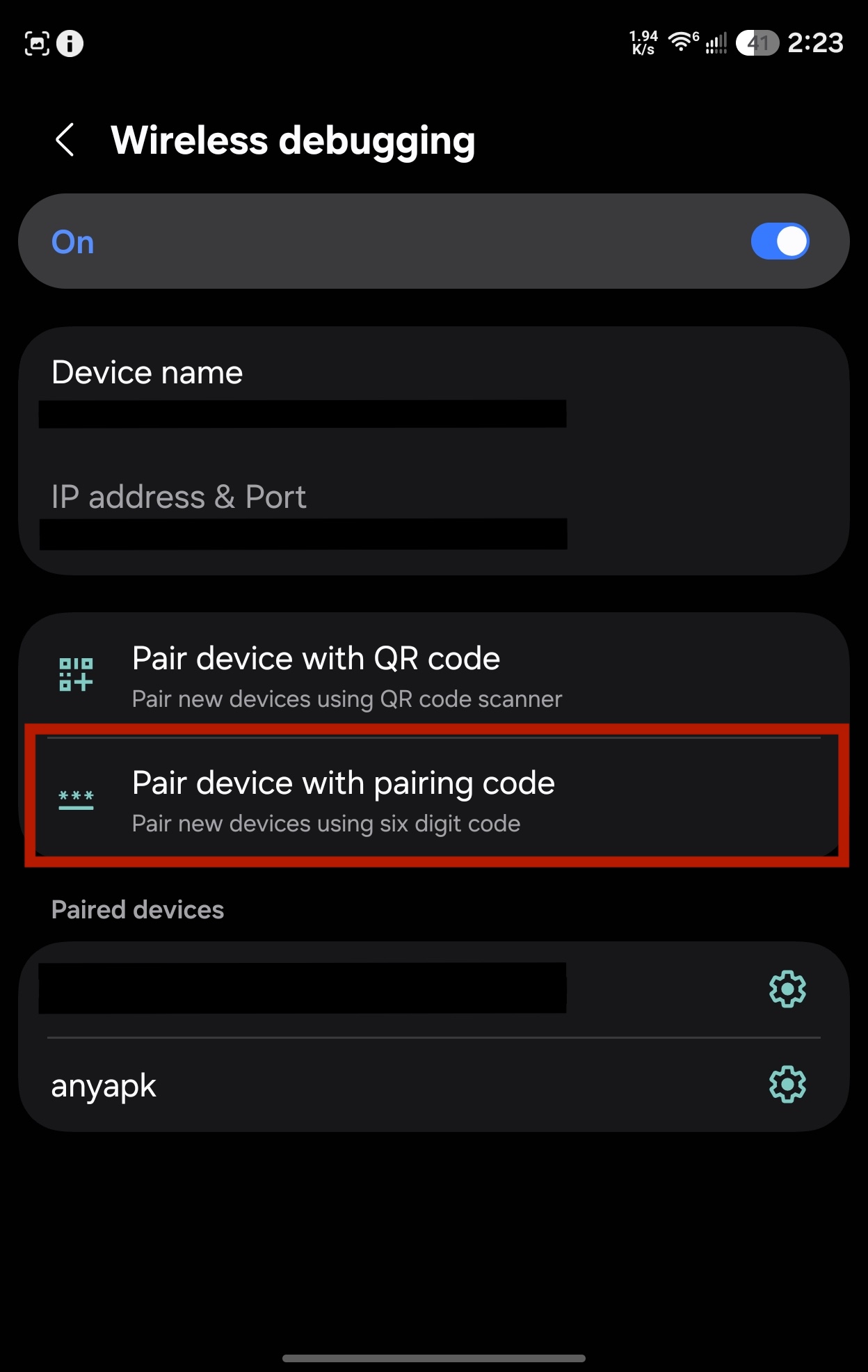 Wireless debugging screen with Pair device with pairing code highlighted